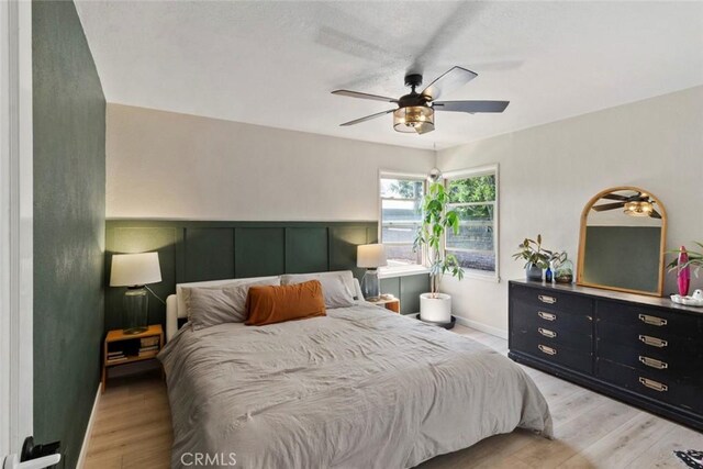 8 Barton Pkwy, Oakdale, CA 95361 - bedroom featuring light wood-type flooring and a ceiling fan