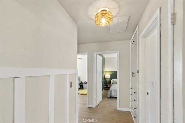 8 Barton Pkwy, Oakdale, CA 95361 - corridor with light wood-type flooring and baseboards