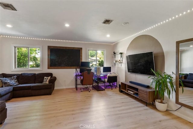 8 Barton Pkwy, Oakdale, CA 95361 - living room with wood finished floors, recessed lighting, and a desk