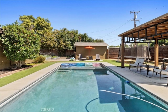 8 Barton Pkwy, Oakdale, CA 95361 - view of pool with a fenced backyard, a patio area, and an outdoor structure