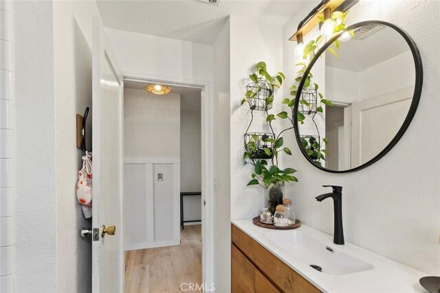8 Barton Pkwy, Oakdale, CA 95361 - bathroom featuring vanity and wood finished floors