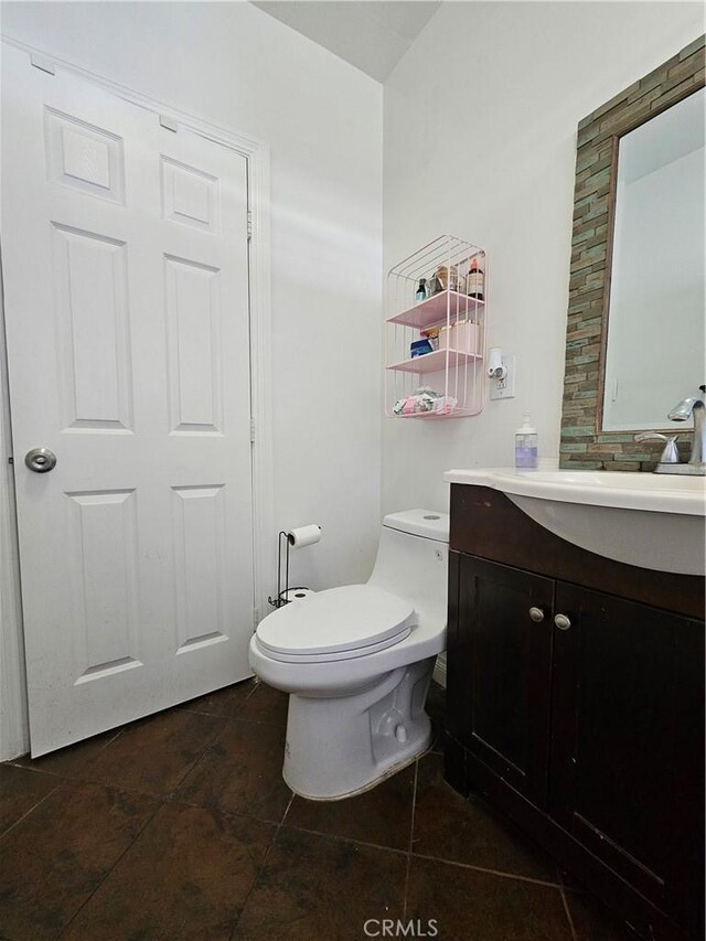 1722 W 60th Pl, Los Angeles, CA 90047 - half bath with vanity and tile patterned floors