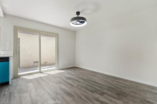 1077 Santo Antonio Dr Unit 54, Colton, CA 92324 - empty room featuring wood finished floors and plenty of natural light