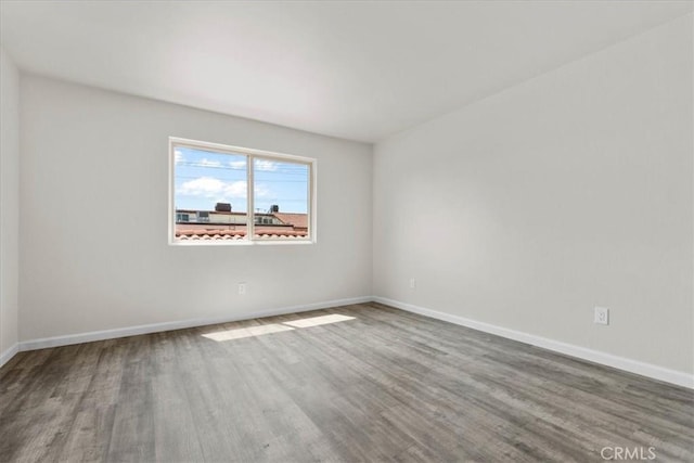 1077 Santo Antonio Dr Unit 54, Colton, CA 92324 - empty room featuring wood finished floors and baseboards