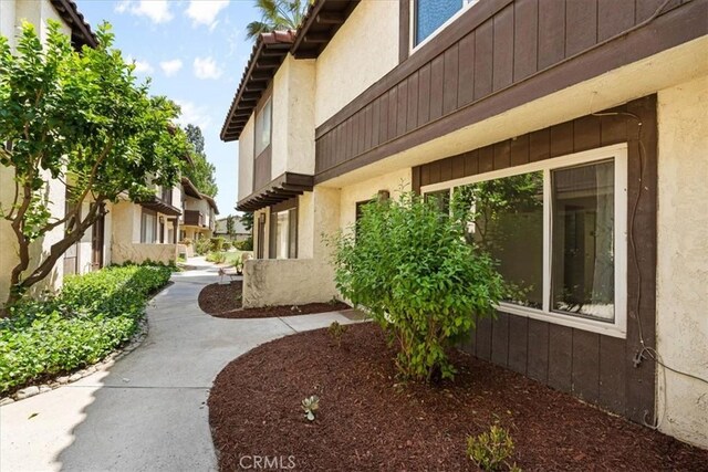 1077 Santo Antonio Dr Unit 54, Colton, CA 92324 - view of side of property with stucco siding