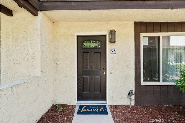 1077 Santo Antonio Dr Unit 54, Colton, CA 92324 - entrance to property with stucco siding