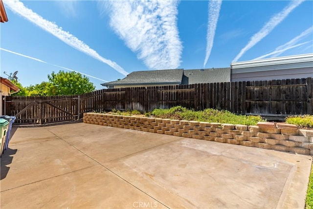 1678 Bella Vista Ct, Paso Robles, CA 93446 - fenced backyard with a patio and a gate