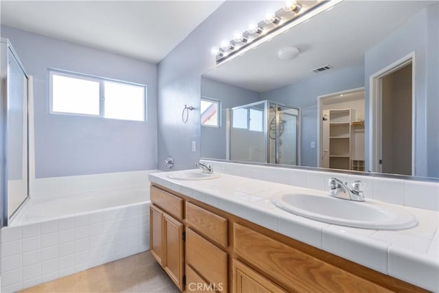 1678 Bella Vista Ct, Paso Robles, CA 93446 - bathroom featuring a shower stall, double vanity, a bath, and a walk in closet