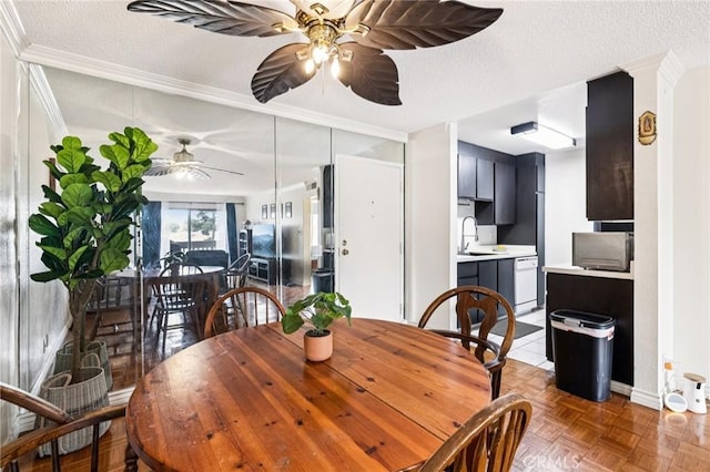 1610 Neil Armstrong St Unit 313, Montebello, CA 90640 - dining space with a ceiling fan, crown molding, and a textured ceiling
