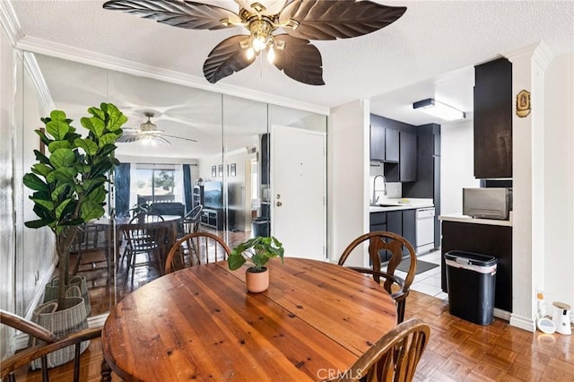 1610 Neil Armstrong St Unit 313, Montebello, CA 90640 - dining room with a ceiling fan, ornamental molding, and a textured ceiling
