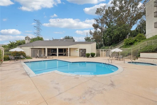 1610 Neil Armstrong St Unit 313, Montebello, CA 90640 - community pool with a patio area and a community hot tub