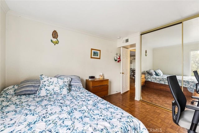 1610 Neil Armstrong St Unit 313, Montebello, CA 90640 - bedroom featuring crown molding and a closet