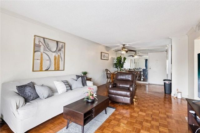 1610 Neil Armstrong St Unit 313, Montebello, CA 90640 - living room featuring crown molding, a ceiling fan, and a textured ceiling