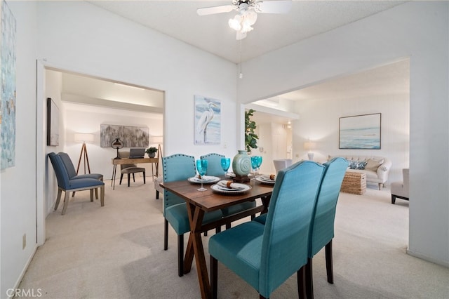 1670 Interlachen Rd Unit 43J, Seal Beach, CA 90740 - dining space featuring light carpet and ceiling fan