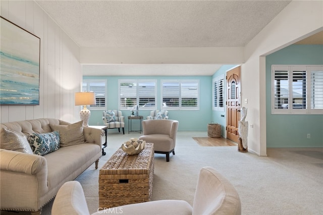 1670 Interlachen Rd Unit 43J, Seal Beach, CA 90740 - carpeted living area featuring a textured ceiling