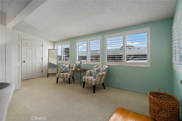 1670 Interlachen Rd Unit 43J, Seal Beach, CA 90740 - living area featuring a textured ceiling and carpet floors