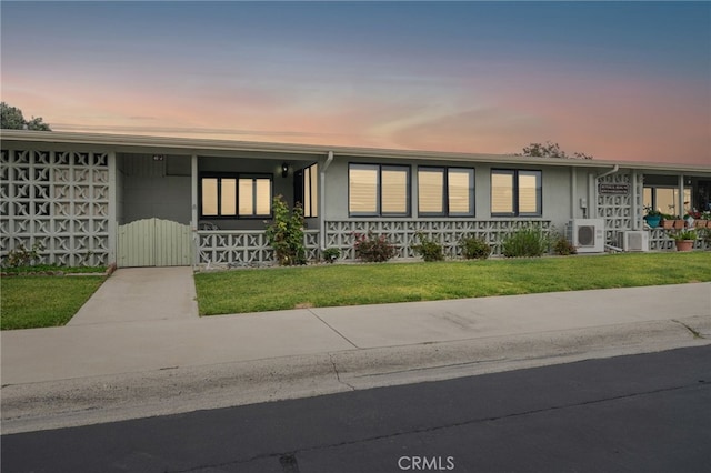 1670 Interlachen Rd Unit 43J, Seal Beach, CA 90740 - view of front of house with a front yard and a porch