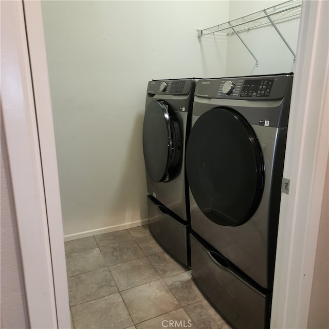 4979 Graphite Creek Rd, Jurupa Valley, CA 91752 - washroom with washing machine and clothes dryer