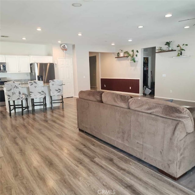4979 Graphite Creek Rd, Jurupa Valley, CA 91752 - living area with recessed lighting and wood finished floors