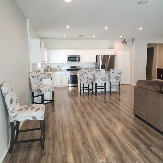 4979 Graphite Creek Rd, Jurupa Valley, CA 91752 - living room with recessed lighting and dark wood-type flooring