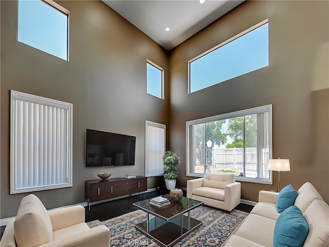 609 Raphael Dr, Corona, CA 92882 - living area with a high ceiling and wood finished floors