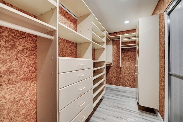 609 Raphael Dr, Corona, CA 92882 - spacious closet with wood finished floors