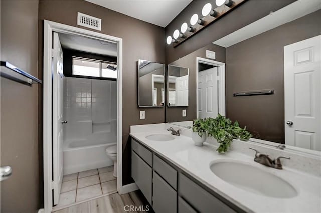 609 Raphael Dr, Corona, CA 92882 - bathroom with double vanity, shower / tub combination, and tile patterned floors
