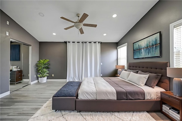 609 Raphael Dr, Corona, CA 92882 - bedroom with wood finished floors, vaulted ceiling, recessed lighting, and a ceiling fan