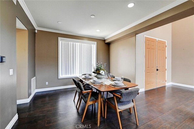609 Raphael Dr, Corona, CA 92882 - dining area with ornamental molding, dark wood-style floors, and recessed lighting