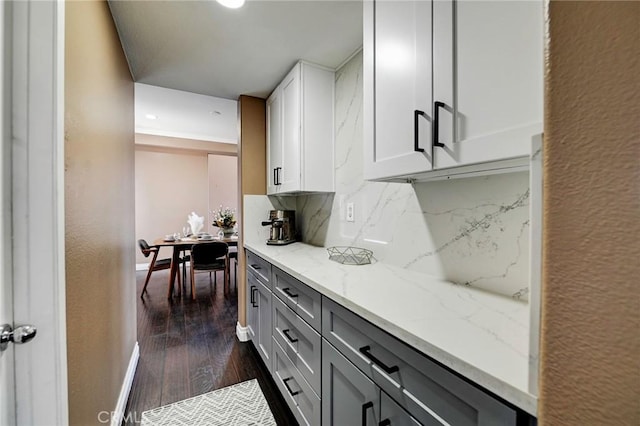 609 Raphael Dr, Corona, CA 92882 - kitchen featuring dark wood finished floors, backsplash, light stone countertops, gray cabinets, and recessed lighting