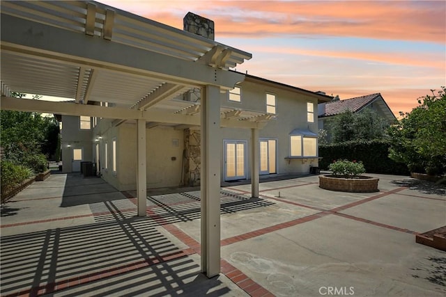 24615 Kings Rd, Laguna Niguel, CA 92677 - patio terrace at dusk with a pergola and a patio area