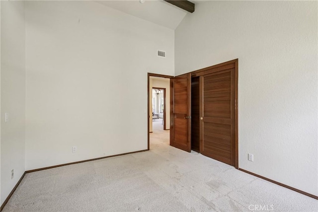 24615 Kings Rd, Laguna Niguel, CA 92677 - unfurnished bedroom featuring beamed ceiling, carpet, high vaulted ceiling, and a closet