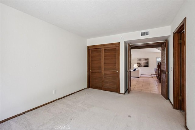 24615 Kings Rd, Laguna Niguel, CA 92677 - unfurnished bedroom with light colored carpet and a closet