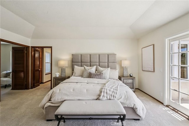 24615 Kings Rd, Laguna Niguel, CA 92677 - bedroom featuring vaulted ceiling, light colored carpet, and access to exterior