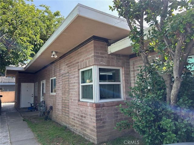 14914 Sylvan St, Van Nuys, CA 91411 - view of home's exterior featuring brick siding