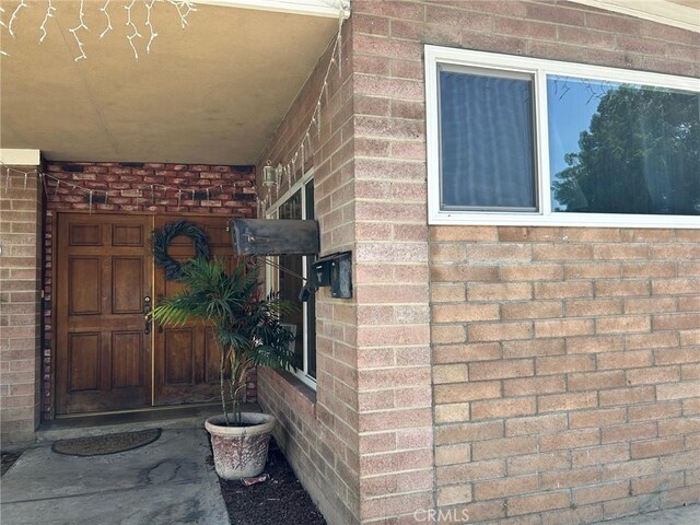 14914 Sylvan St, Van Nuys, CA 91411 - entrance to property with brick siding
