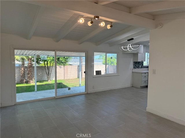 14516 Florita Rd, La Mirada, CA 90638 - tiled spare room with a chandelier and baseboards