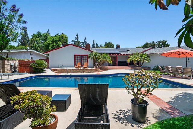 10225 Donna Ave, Northridge, CA 91324 - view of swimming pool featuring a patio and a diving board