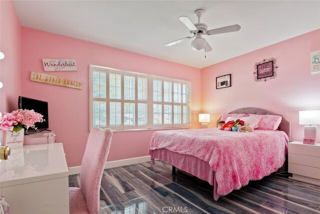 10225 Donna Ave, Northridge, CA 91324 - bedroom featuring dark wood-style floors and ceiling fan