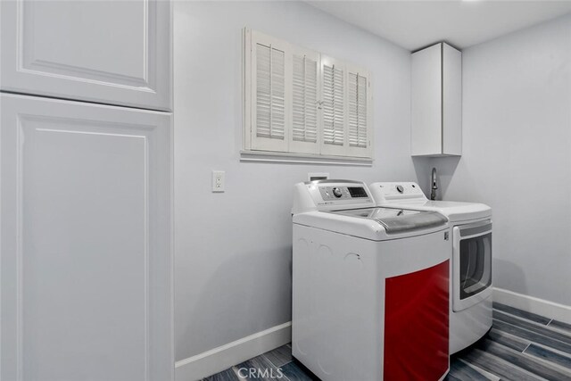 10225 Donna Ave, Northridge, CA 91324 - laundry area featuring separate washer and dryer, cabinet space, and dark wood-style floors