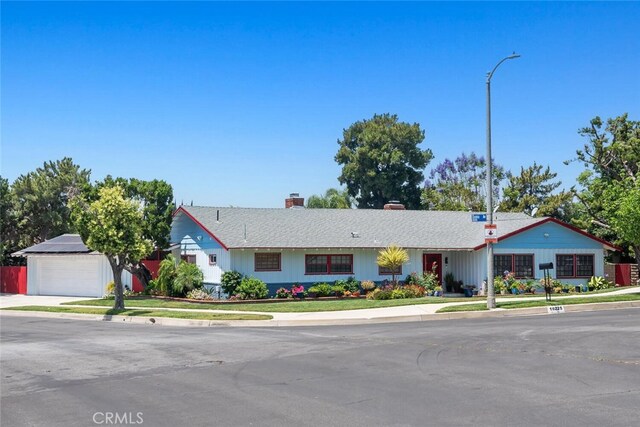 10225 Donna Ave, Northridge, CA 91324 - single story home featuring a chimney and a garage