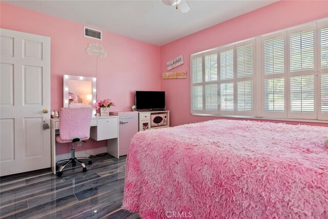 10225 Donna Ave, Northridge, CA 91324 - bedroom with multiple windows, dark wood-style floors, and a desk