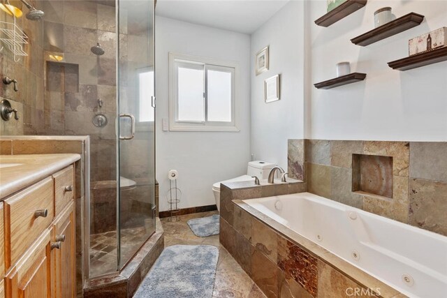 10225 Donna Ave, Northridge, CA 91324 - bathroom with a tub with jets, a shower stall, and vanity