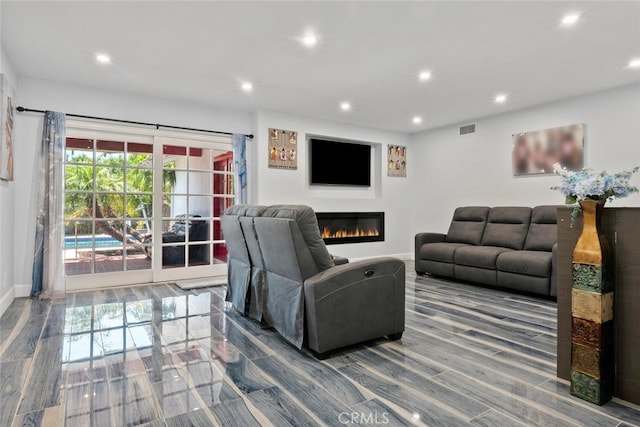 10225 Donna Ave, Northridge, CA 91324 - living area featuring recessed lighting and a glass covered fireplace