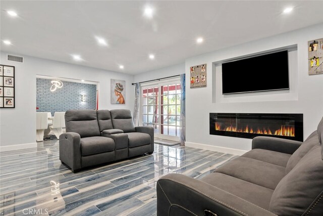 10225 Donna Ave, Northridge, CA 91324 - living area with wood finished floors, recessed lighting, and a glass covered fireplace