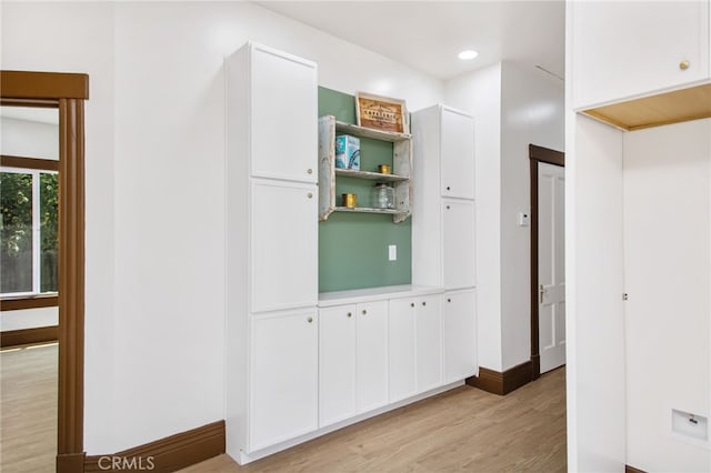 3141 Locust St, Riverside, CA 92501 - corridor featuring light wood finished floors and recessed lighting