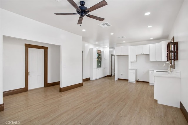 3141 Locust St, Riverside, CA 92501 - unfurnished living room with ceiling fan, light wood-style floors, and recessed lighting