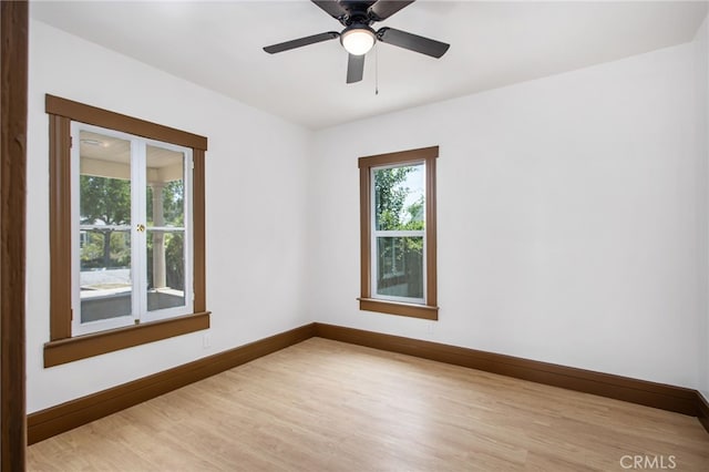 3141 Locust St, Riverside, CA 92501 - empty room with light wood finished floors and ceiling fan