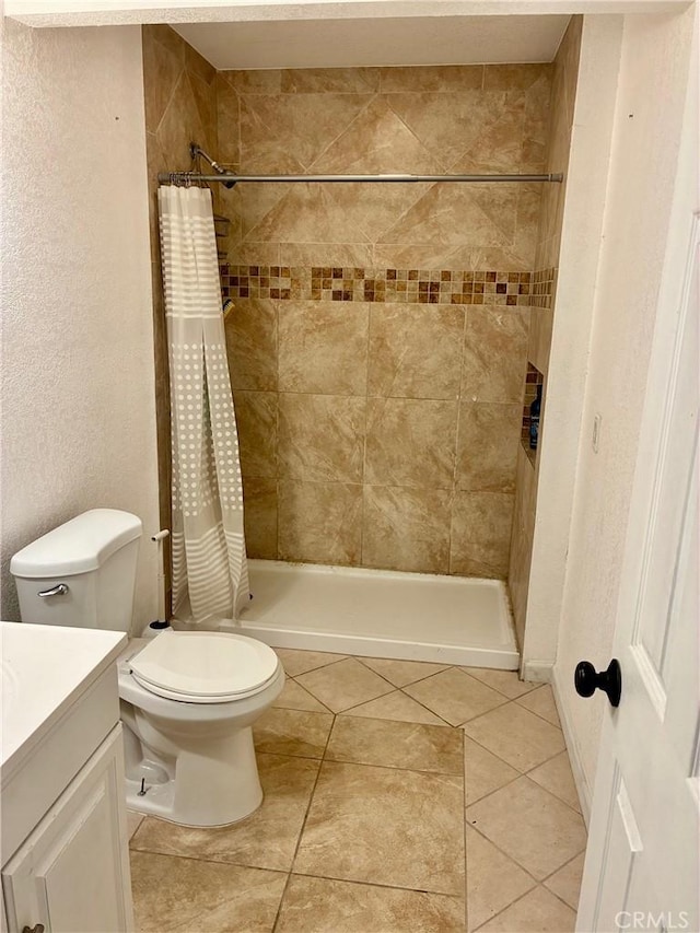 15400 Don Roberto Rd, Victorville, CA 92394 - full bath with vanity, a tile shower, and tile patterned flooring
