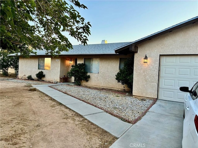 15400 Don Roberto Rd, Victorville, CA 92394 - ranch-style house with a garage, stucco siding, a shingled roof, and concrete driveway